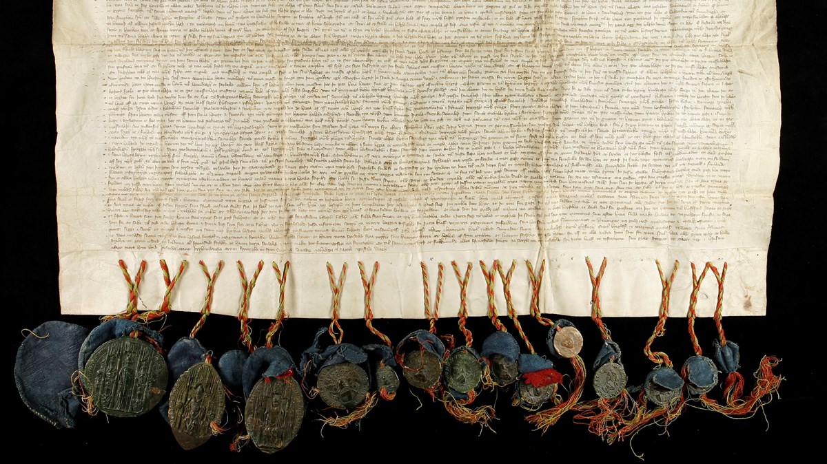 Ett medeltida testamente med sigill hängande nedtill